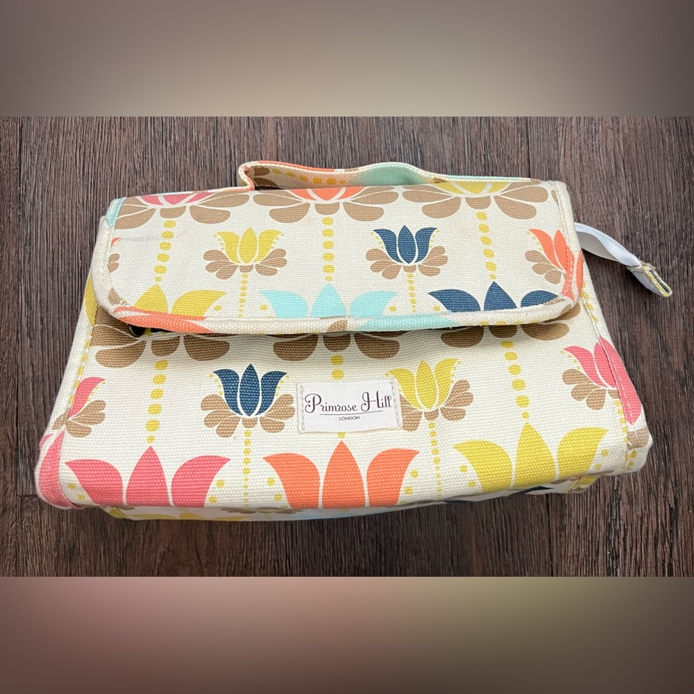 Like new Primrose Hill London Cream Lotus Flower make up cosmetics bag.